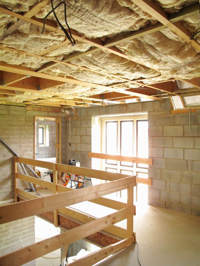 Isolation complète de plafond avec laine soufflée dans une construction résidentielle  à Amos